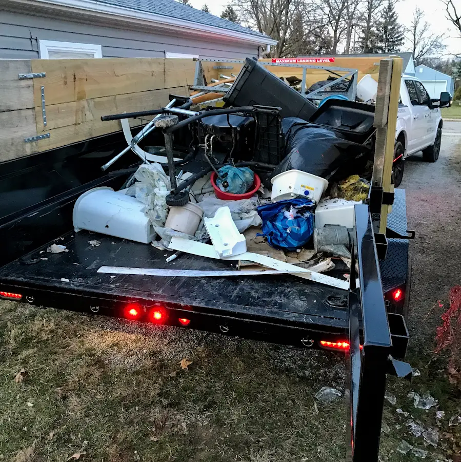 Roll-off dumpster delivered to a residential driveway in Loyola